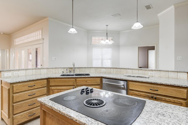 kitchen featuring sink, black electric cooktop, ornamental molding, pendant lighting, and light stone countertops