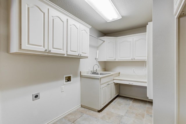 laundry room with sink, hookup for a washing machine, cabinets, and hookup for an electric dryer