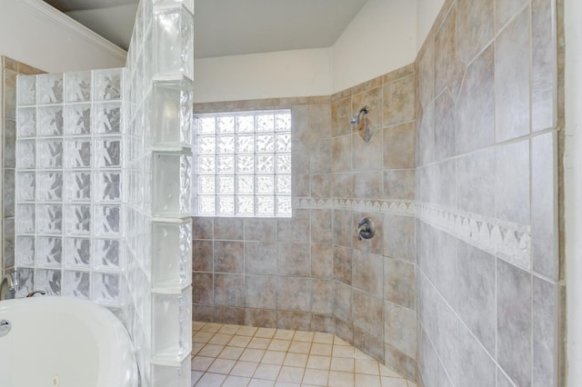 bathroom featuring shower with separate bathtub