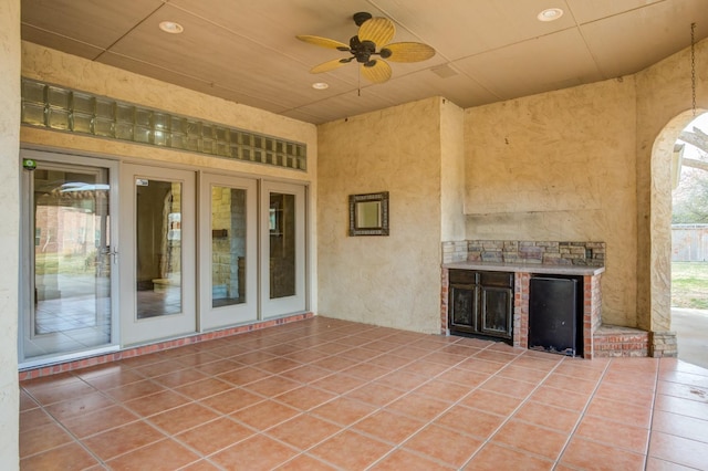 view of patio with ceiling fan