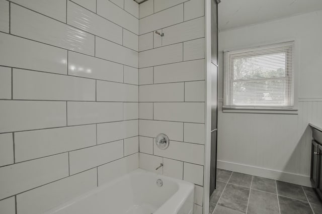 bathroom with vanity, tile patterned floors, and tiled shower / bath