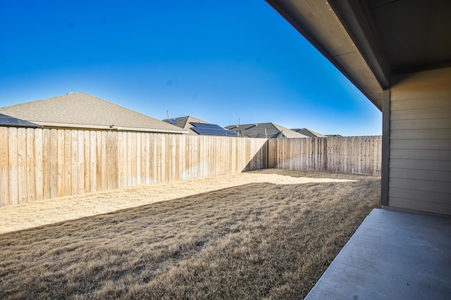 view of yard featuring a fenced backyard