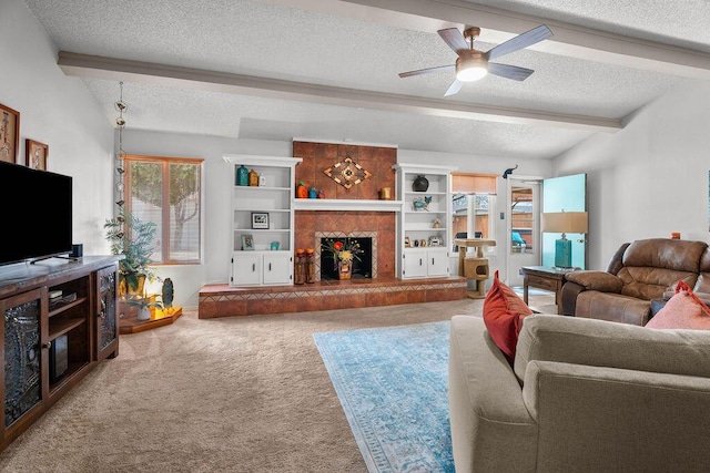 4405 56th St, Lubbock, TX 79414 - carpeted living room with a textured ceiling, beamed ceiling, ceiling fan, a tile fireplace, and baseboards