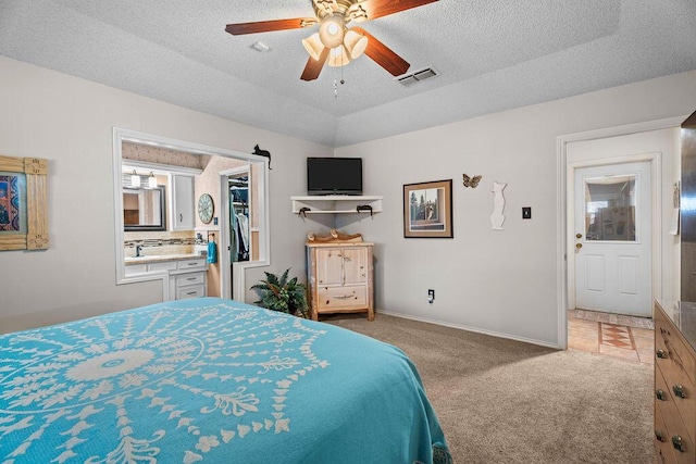 4405 56th St, Lubbock, TX 79414 - carpeted bedroom featuring a textured ceiling, ceiling fan, and baseboards