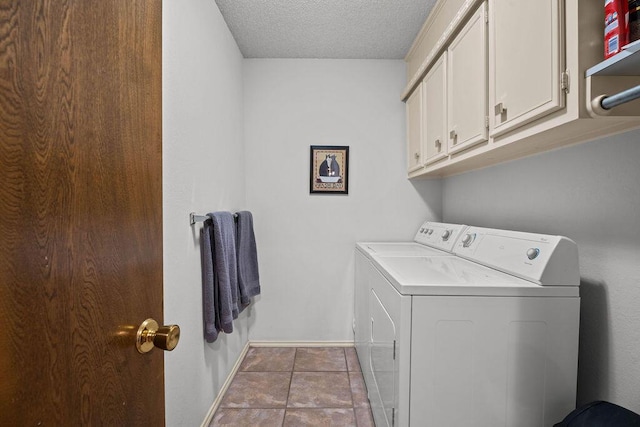 4405 56th St, Lubbock, TX 79414 - washroom featuring washer and dryer, cabinet space, baseboards, tile patterned floors, and a textured ceiling