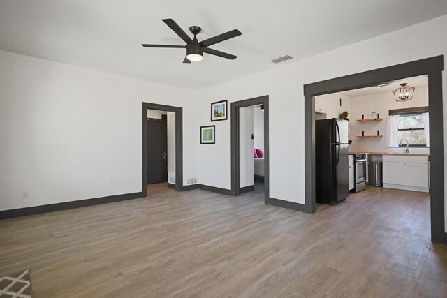 bedroom featuring hardwood / wood-style floors and ceiling fan