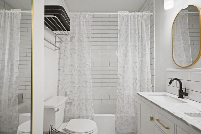 full bathroom with vanity, shower / bath combination with curtain, backsplash, and toilet