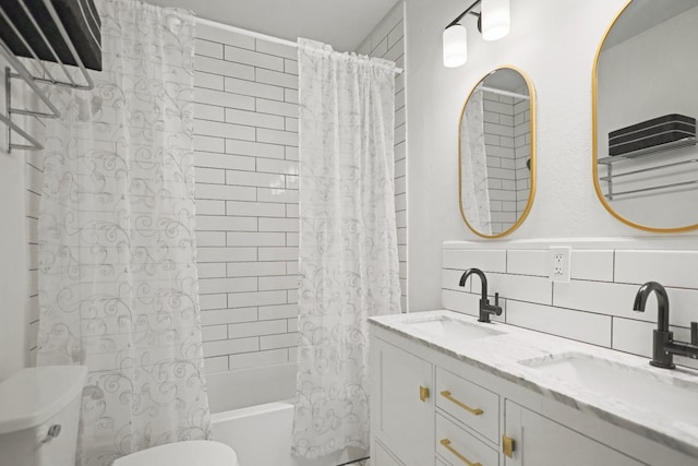 full bathroom with tasteful backsplash, vanity, toilet, and shower / bath combo with shower curtain