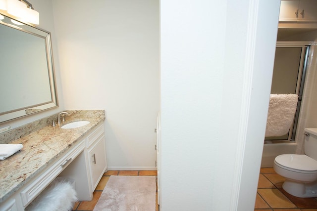 bathroom with vanity and tile patterned flooring