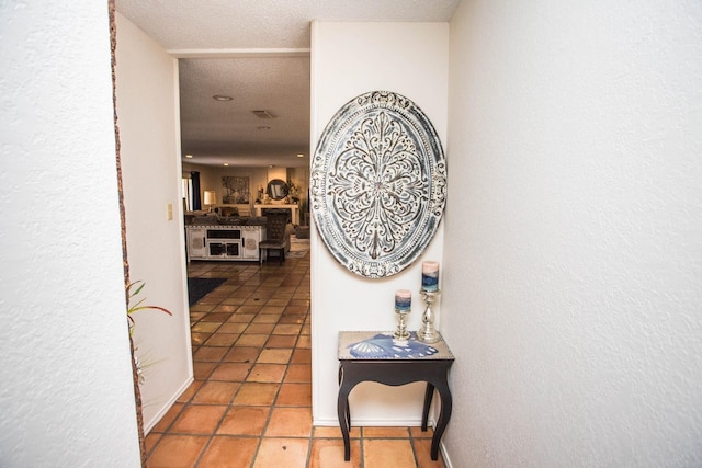 corridor featuring tile patterned flooring