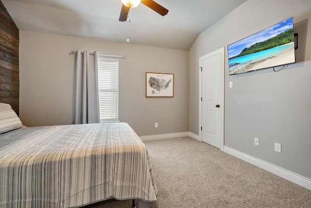 carpeted bedroom with lofted ceiling and ceiling fan