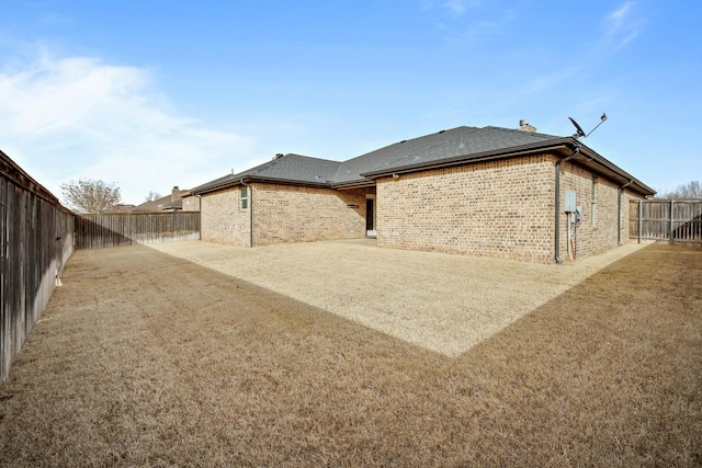 back of house with a patio area