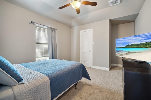 bedroom featuring ceiling fan and light carpet