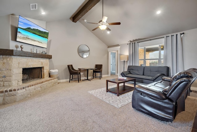 carpeted living room featuring ceiling fan, a fireplace, high vaulted ceiling, and beamed ceiling