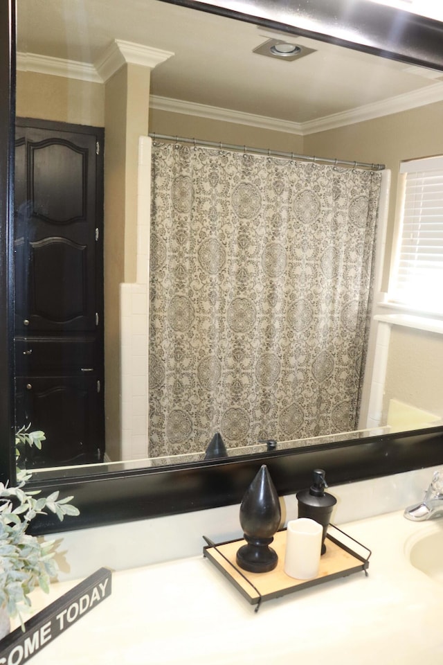 full bathroom with crown molding