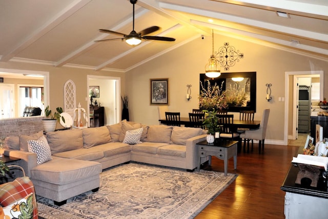 living area featuring vaulted ceiling with beams, ceiling fan, wood finished floors, and baseboards