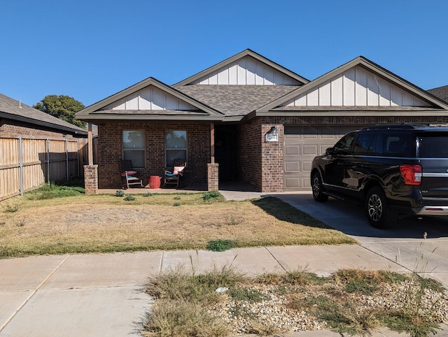 view of front facade featuring a garage and a front yard