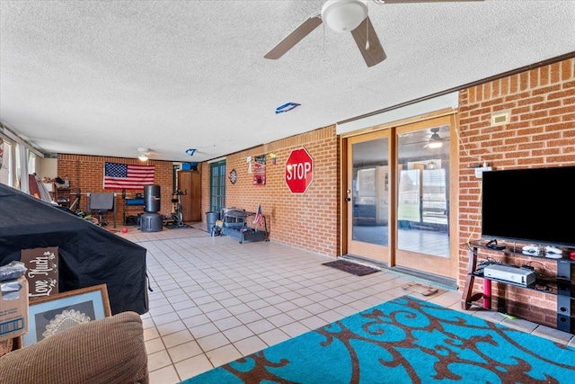 view of patio with ceiling fan