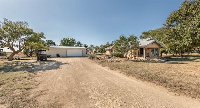 ranch-style home featuring a porch and a front lawn