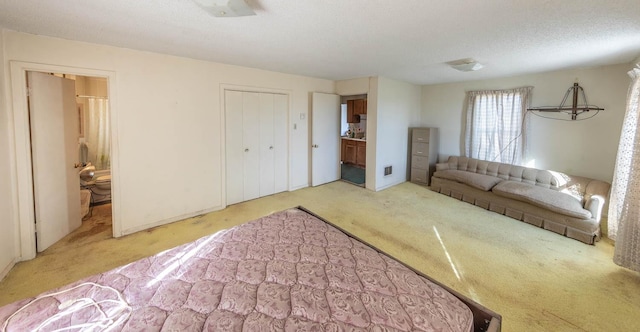 living room featuring a textured ceiling and carpet