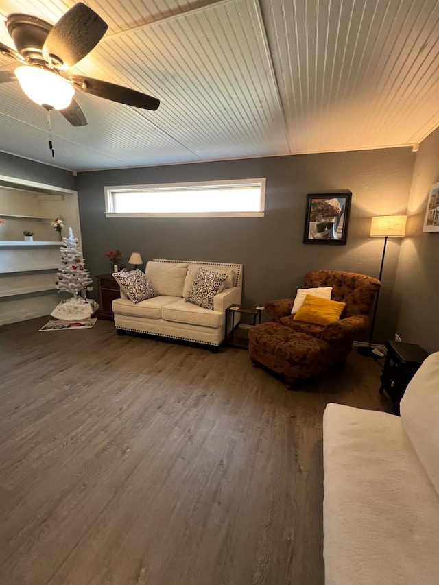 living room featuring hardwood / wood-style flooring, wood ceiling, and a healthy amount of sunlight