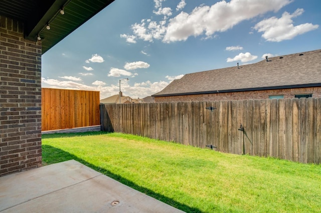 view of yard with a patio area