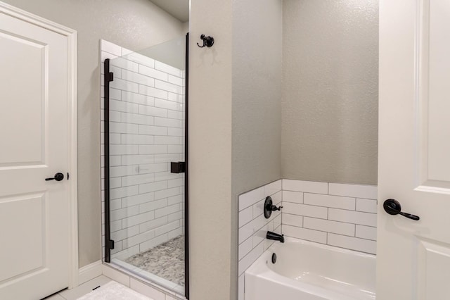 bathroom with separate shower and tub