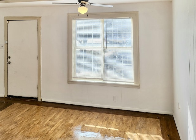 unfurnished room featuring light hardwood / wood-style flooring and ceiling fan