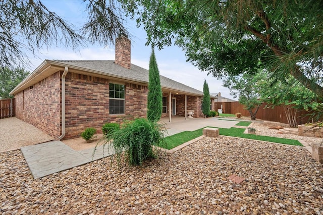 rear view of house with a patio area