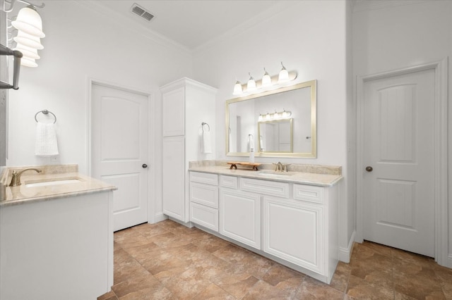 bathroom featuring vanity and crown molding