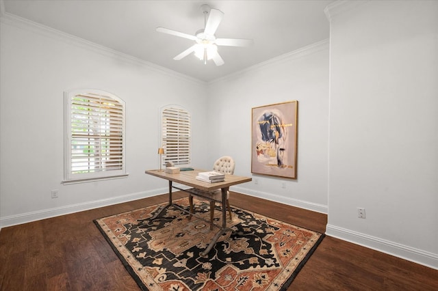 office featuring dark wood-type flooring, ornamental molding, and ceiling fan