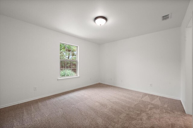 empty room with carpet floors