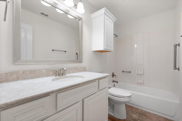 full bathroom featuring vanity, toilet, and tub / shower combination