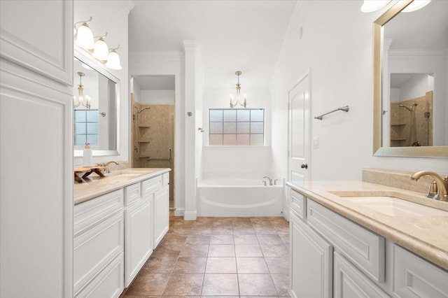 bathroom with an inviting chandelier, crown molding, tile patterned floors, and shower with separate bathtub