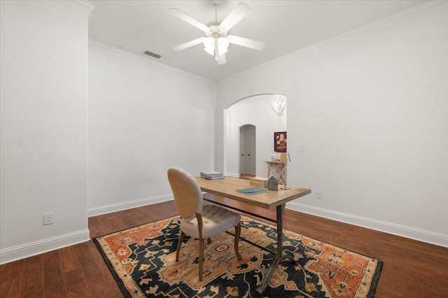 office space with ceiling fan, ornamental molding, and dark hardwood / wood-style flooring