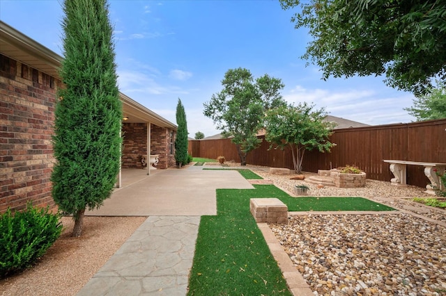 view of yard with a patio area