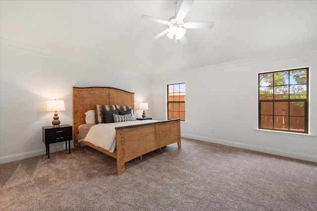 bedroom featuring ornamental molding, ceiling fan, and carpet