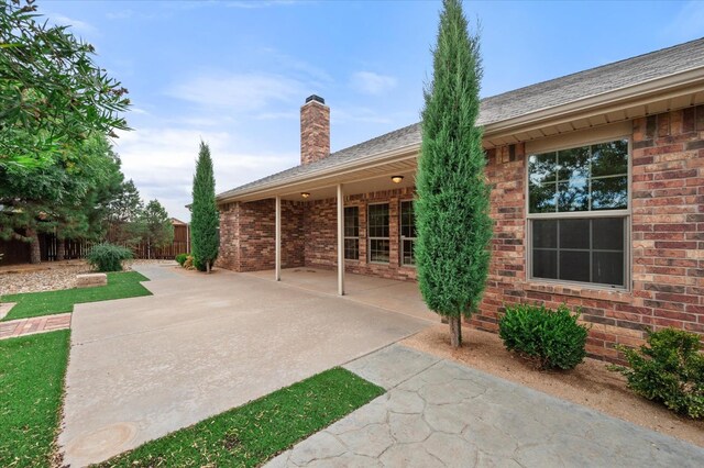 back of house featuring a patio