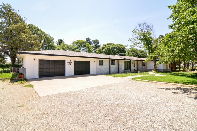 2911 US Highway 385, Littlefield, TX 79339 - single story home with a garage and a front yard