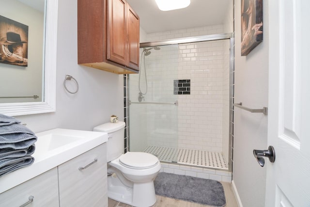 2911 US Highway 385, Littlefield, TX 79339 - bathroom with vanity, toilet, and a shower with shower door