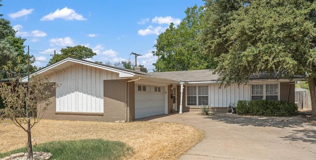 ranch-style home featuring a garage