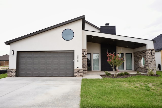 3628 119th St, Lubbock, TX 79423 - view of front of property featuring brick siding, stucco siding, a chimney, and concrete driveway