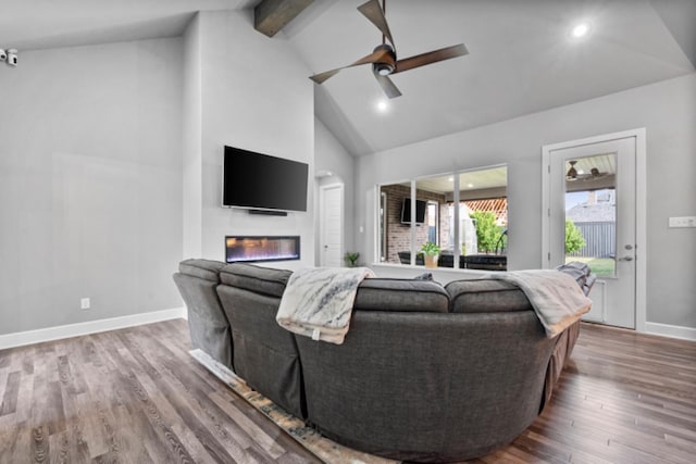 living room with beamed ceiling, ceiling fan, wood-type flooring, and high vaulted ceiling