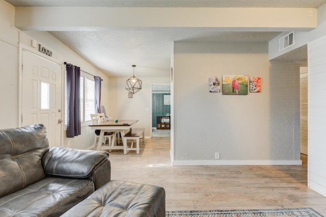 living room with light hardwood / wood-style floors