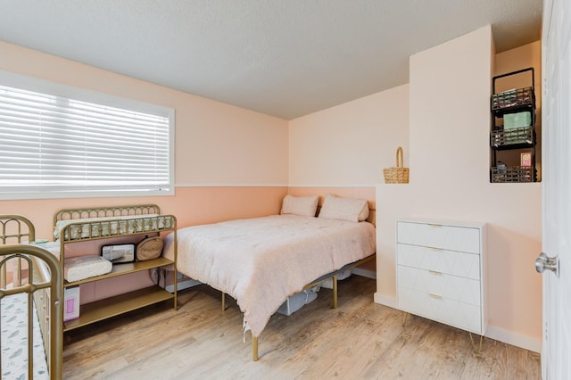 bedroom featuring light hardwood / wood-style flooring