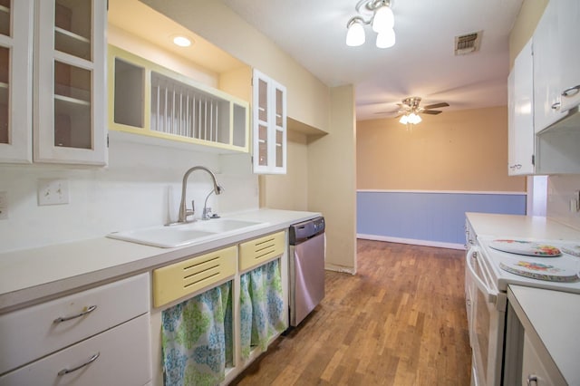 kitchen with sink, ceiling fan, white cabinetry, white range with electric stovetop, and stainless steel dishwasher