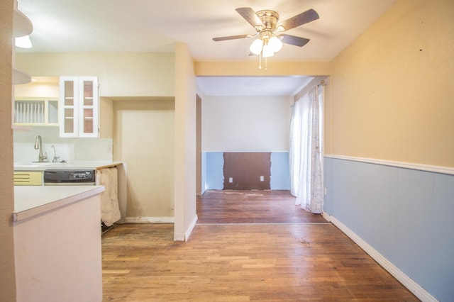 interior space featuring sink and light hardwood / wood-style flooring