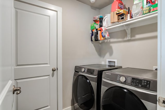 laundry room with washer and clothes dryer