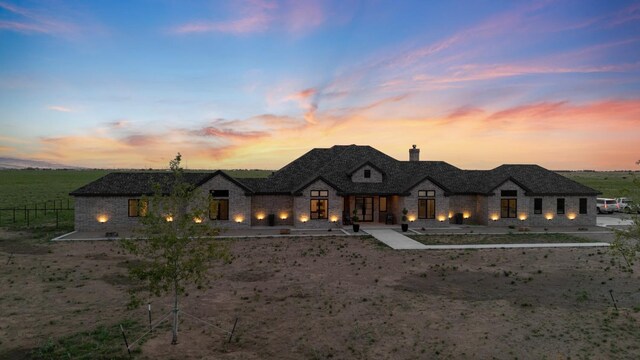 view of french country inspired facade