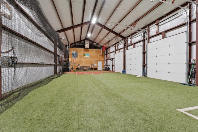 garage featuring a yard